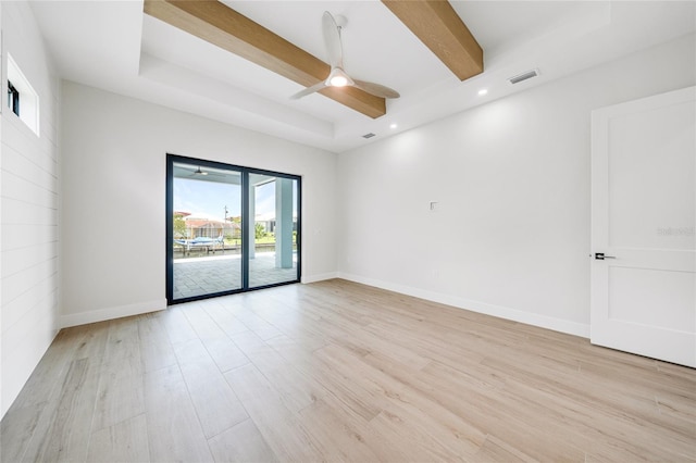 2815 Coral Way, Punta Gorda, FL 33950 - unfurnished room with light wood-style floors, ceiling fan, beam ceiling, a raised ceiling, and recessed lighting