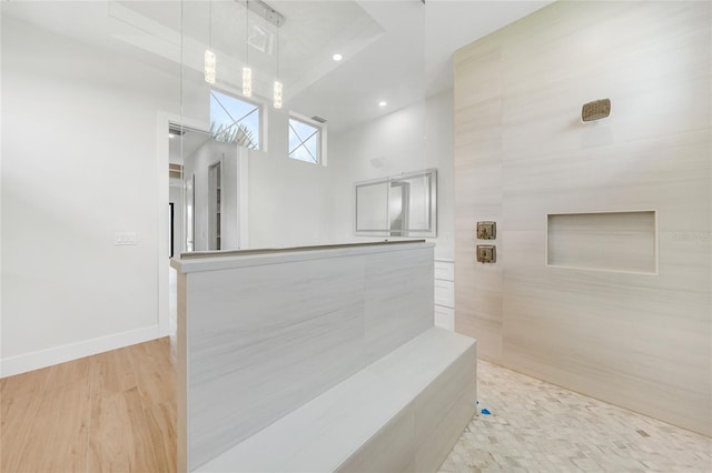 2815 Coral Way, Punta Gorda, FL 33950 - bathroom featuring tiled shower, wood finished floors, and recessed lighting
