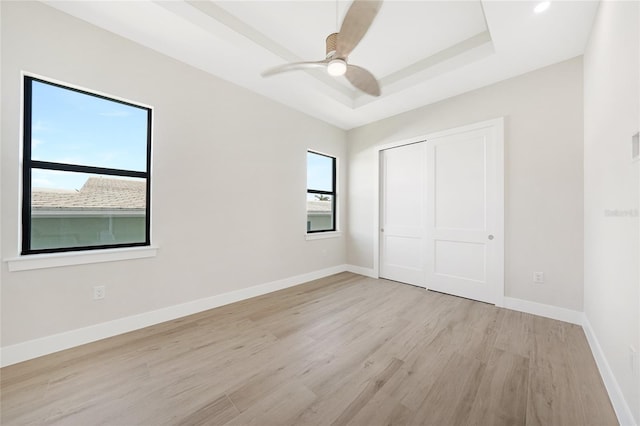 2815 Coral Way, Punta Gorda, FL 33950 - unfurnished bedroom with light wood-style flooring, a closet, and ceiling fan