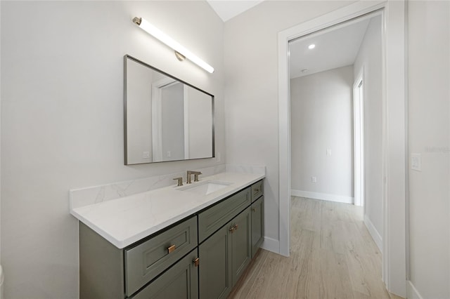 2815 Coral Way, Punta Gorda, FL 33950 - bathroom with vanity, wood finished floors, and recessed lighting