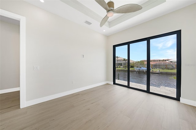 2815 Coral Way, Punta Gorda, FL 33950 - empty room with light wood-type flooring, a water view, recessed lighting, and a ceiling fan