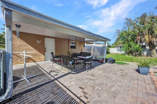 25082 Harborview Rd, Punta Gorda, FL 33980 - view of patio featuring an outdoor hangout area