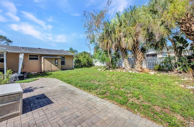 25082 Harborview Rd, Punta Gorda, FL 33980 - fenced backyard with a patio