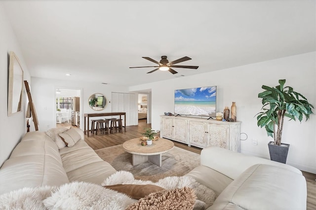 23465 Harborview Rd Unit 1031, Punta Gorda, FL 33980 - living area with ceiling fan and wood finished floors