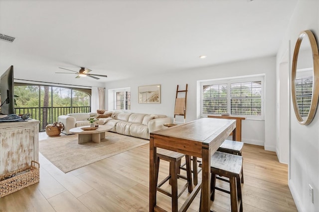 23465 Harborview Rd Unit 1031, Punta Gorda, FL 33980 - living room featuring healthy amount of natural light, ceiling fan, light wood finished floors, and recessed lighting