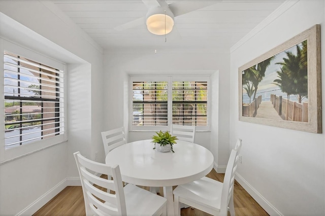 23465 Harborview Rd Unit 1031, Punta Gorda, FL 33980 - dining area featuring wood finished floors and ceiling fan