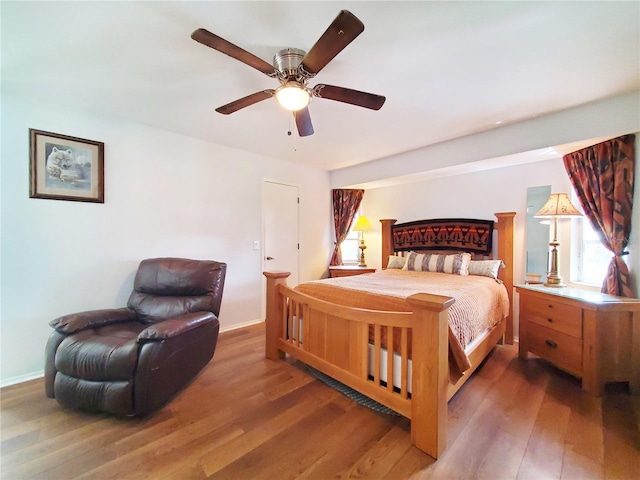 3456 Highlands Rd, Punta Gorda, FL 33983 - bedroom with wood finished floors and ceiling fan