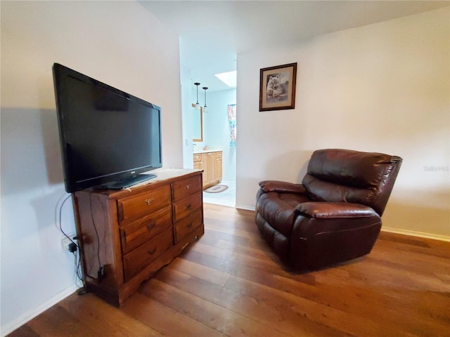 3456 Highlands Rd, Punta Gorda, FL 33983 - living area featuring wood finished floors and baseboards