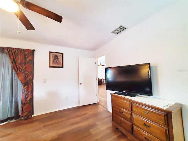3456 Highlands Rd, Punta Gorda, FL 33983 - living room with a ceiling fan and wood finished floors