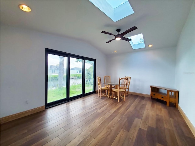 3456 Highlands Rd, Punta Gorda, FL 33983 - living area featuring a skylight, vaulted ceiling, wood finished floors, recessed lighting, and ceiling fan