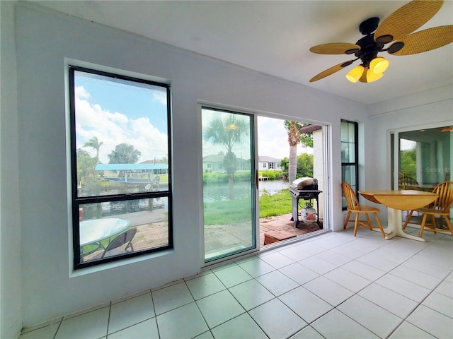 3456 Highlands Rd, Punta Gorda, FL 33983 - sunroom / solarium featuring healthy amount of natural light and a water view