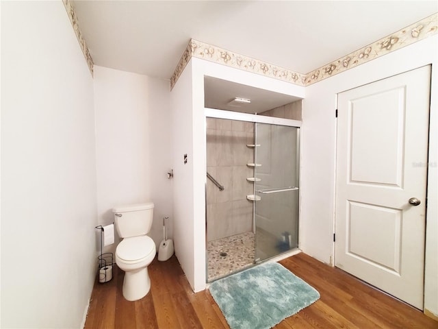 3456 Highlands Rd, Punta Gorda, FL 33983 - full bathroom featuring wood finished floors and a stall shower