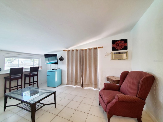 3456 Highlands Rd, Punta Gorda, FL 33983 - living area featuring lofted ceiling, light tile patterned floors, and a wall unit AC
