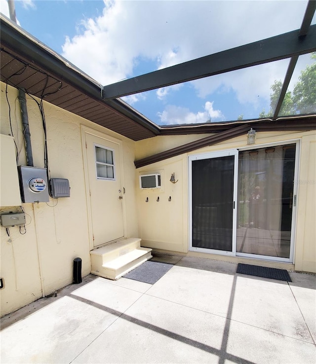 3456 Highlands Rd, Punta Gorda, FL 33983 - doorway to property with a patio area and stucco siding