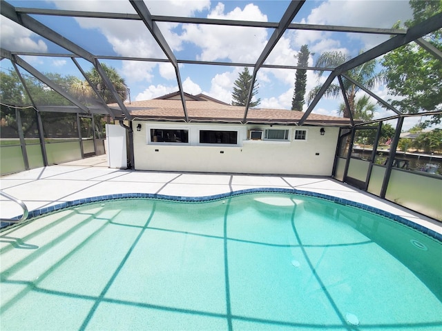 3456 Highlands Rd, Punta Gorda, FL 33983 - swimming pool with a patio and glass enclosure