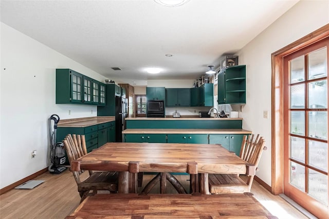 2788 SW County Road 769, Arcadia, FL 34266 - dining room featuring light wood-style flooring and baseboards