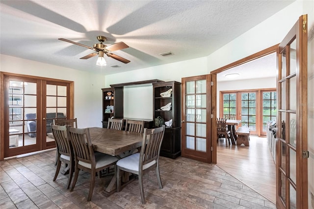 2788 SW County Road 769, Arcadia, FL 34266 - dining room featuring french doors, wood finished floors, and a ceiling fan