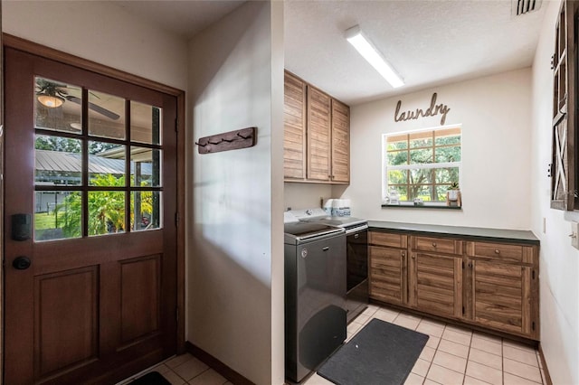 2788 SW County Road 769, Arcadia, FL 34266 - laundry room with cabinet space, independent washer and dryer, light tile patterned flooring, and a ceiling fan