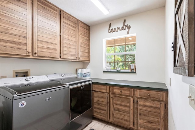 2788 SW County Road 769, Arcadia, FL 34266 - laundry room with cabinet space, washer and clothes dryer, and light tile patterned flooring