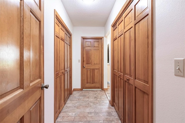 2788 SW County Road 769, Arcadia, FL 34266 - hall featuring light stone finish floors and baseboards