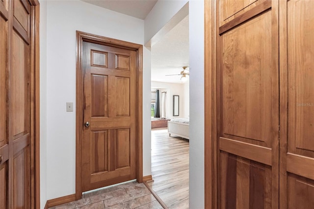 2788 SW County Road 769, Arcadia, FL 34266 - hallway with baseboards and light wood-style floors