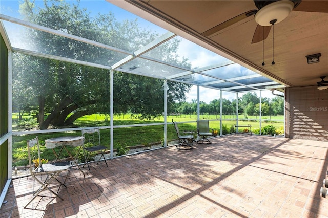 2788 SW County Road 769, Arcadia, FL 34266 - view of patio featuring a ceiling fan, a lanai, and view of wooded area