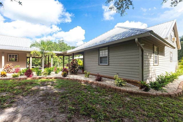 2788 SW County Road 769, Arcadia, FL 34266 - view of side of property with a metal roof