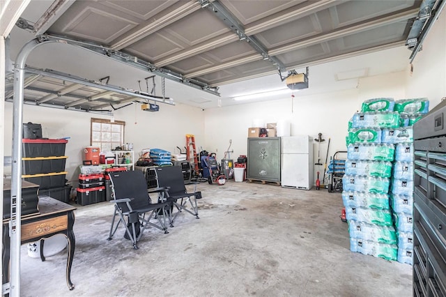 2788 SW County Road 769, Arcadia, FL 34266 - garage featuring a garage door opener and freestanding refrigerator