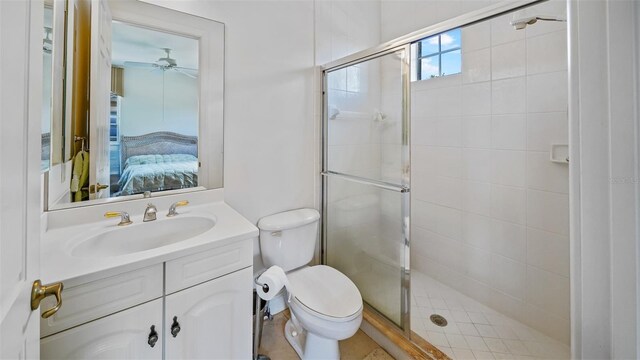 786 Regency Reserve Cir Unit 1404, Naples, FL 34119 - bathroom with a stall shower, ensuite bath, vanity, and a ceiling fan