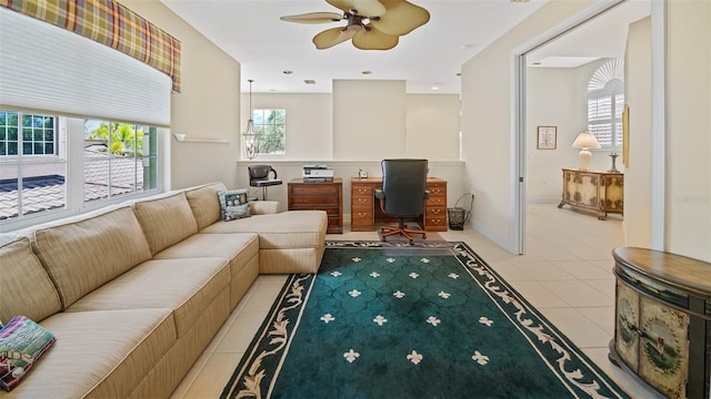 786 Regency Reserve Cir Unit 1404, Naples, FL 34119 - living room with light tile patterned flooring, a ceiling fan, and an office area