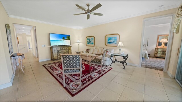 786 Regency Reserve Cir Unit 1404, Naples, FL 34119 - living area with a ceiling fan, light tile patterned flooring, and crown molding