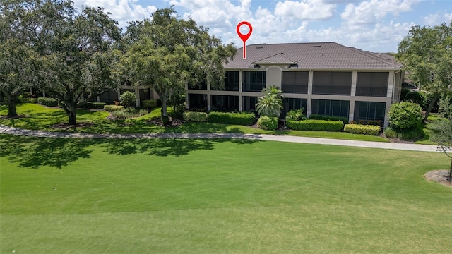 786 Regency Reserve Cir Unit 1404, Naples, FL 34119 - view of community with a yard