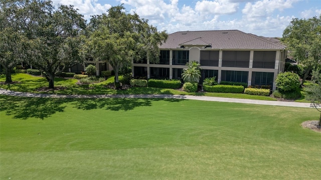 786 Regency Reserve Cir Unit 1404, Naples, FL 34119 - view of community with a lawn