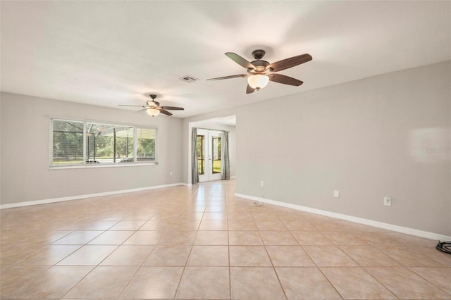 10810 Wheeler Pl, Punta Gorda, FL 33950 - spare room with a ceiling fan and light tile patterned floors