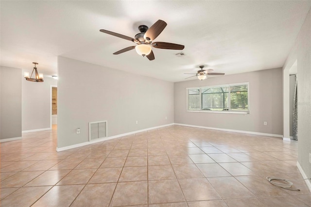 10810 Wheeler Pl, Punta Gorda, FL 33950 - empty room featuring light tile patterned floors and ceiling fan