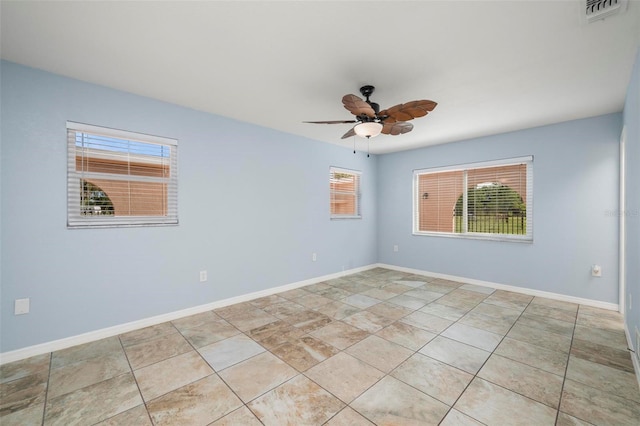 10810 Wheeler Pl, Punta Gorda, FL 33950 - spare room featuring a ceiling fan and baseboards