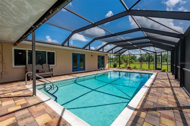 10810 Wheeler Pl, Punta Gorda, FL 33950 - outdoor pool with french doors, a patio area, and glass enclosure
