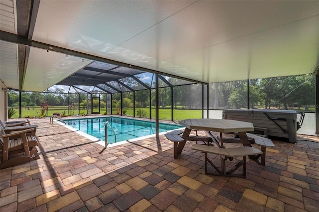 10810 Wheeler Pl, Punta Gorda, FL 33950 - outdoor pool with a hot tub, a patio area, and glass enclosure