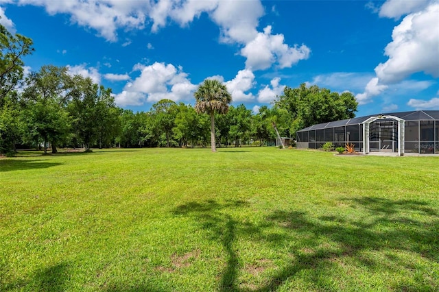 10810 Wheeler Pl, Punta Gorda, FL 33950 - view of grassy yard with a lanai