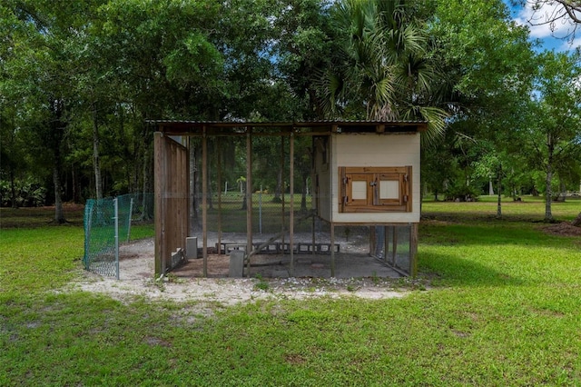 10810 Wheeler Pl, Punta Gorda, FL 33950 - view of poultry coop featuring a lawn