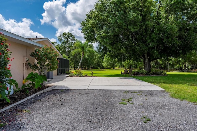 10810 Wheeler Pl, Punta Gorda, FL 33950 - view of green lawn featuring driveway