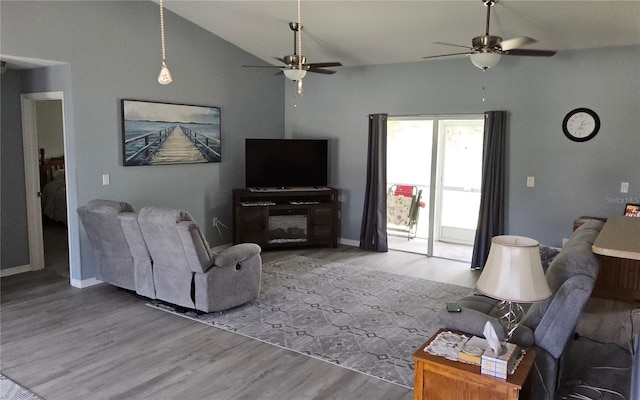 6341 Opa Locka Ln, North Port, FL 34291 - living room with a ceiling fan, wood finished floors, and high vaulted ceiling