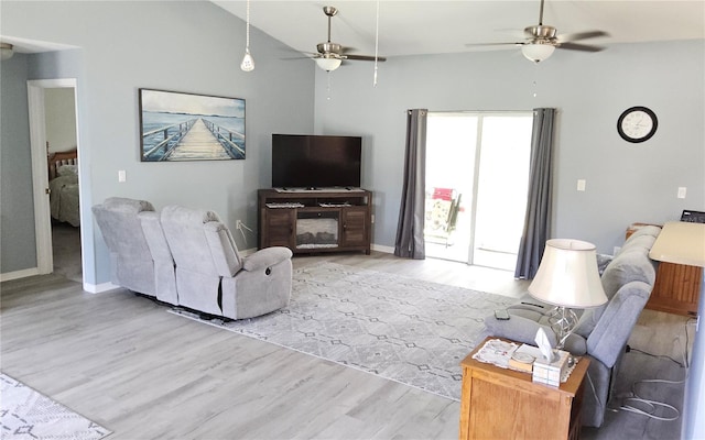 6341 Opa Locka Ln, North Port, FL 34291 - living room featuring ceiling fan, wood finished floors, and high vaulted ceiling