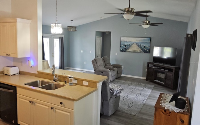 6341 Opa Locka Ln, North Port, FL 34291 - kitchen with dishwasher, open floor plan, dark wood-style flooring, vaulted ceiling, and light countertops
