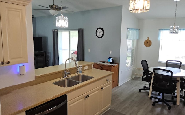 6341 Opa Locka Ln, North Port, FL 34291 - kitchen featuring a chandelier, dishwashing machine, pendant lighting, and lofted ceiling