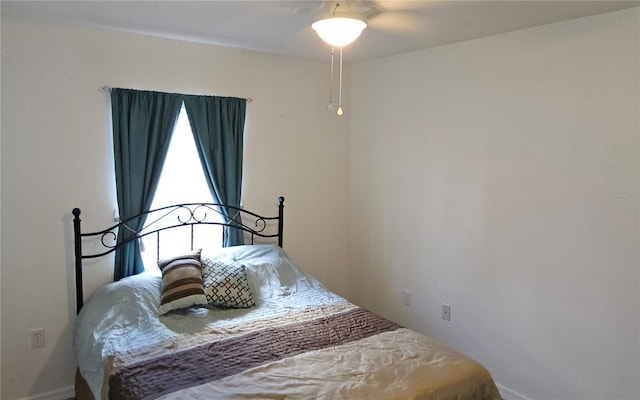 6341 Opa Locka Ln, North Port, FL 34291 - bedroom featuring baseboards and a ceiling fan