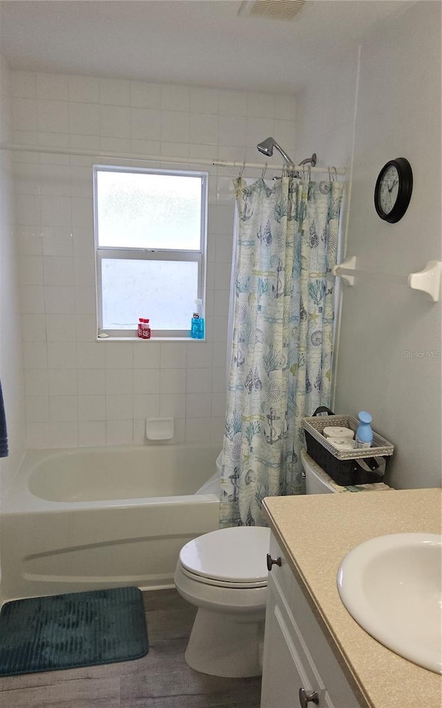 6341 Opa Locka Ln, North Port, FL 34291 - full bath featuring vanity, shower / tub combo with curtain, and wood finished floors