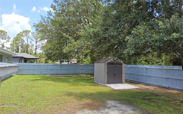 6341 Opa Locka Ln, North Port, FL 34291 - fenced backyard with a storage unit