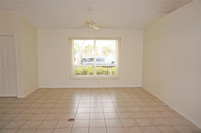 1128 Rum Cay Ct, Punta Gorda, FL 33950 - spare room featuring ceiling fan, light tile patterned floors, and vaulted ceiling