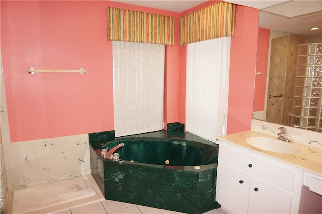 1128 Rum Cay Ct, Punta Gorda, FL 33950 - bathroom with a tub with jets and vanity